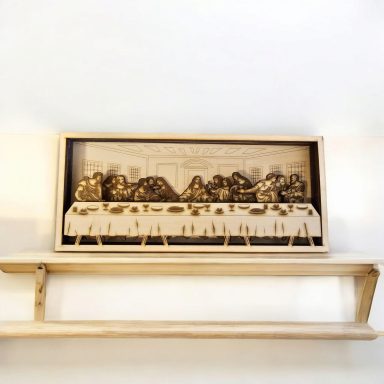 Wooden wall art depicting the Last Supper with a detailed engraving of the scene.